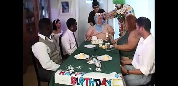  Guy is covered in silly string and getting jerked off by a midget during funny party